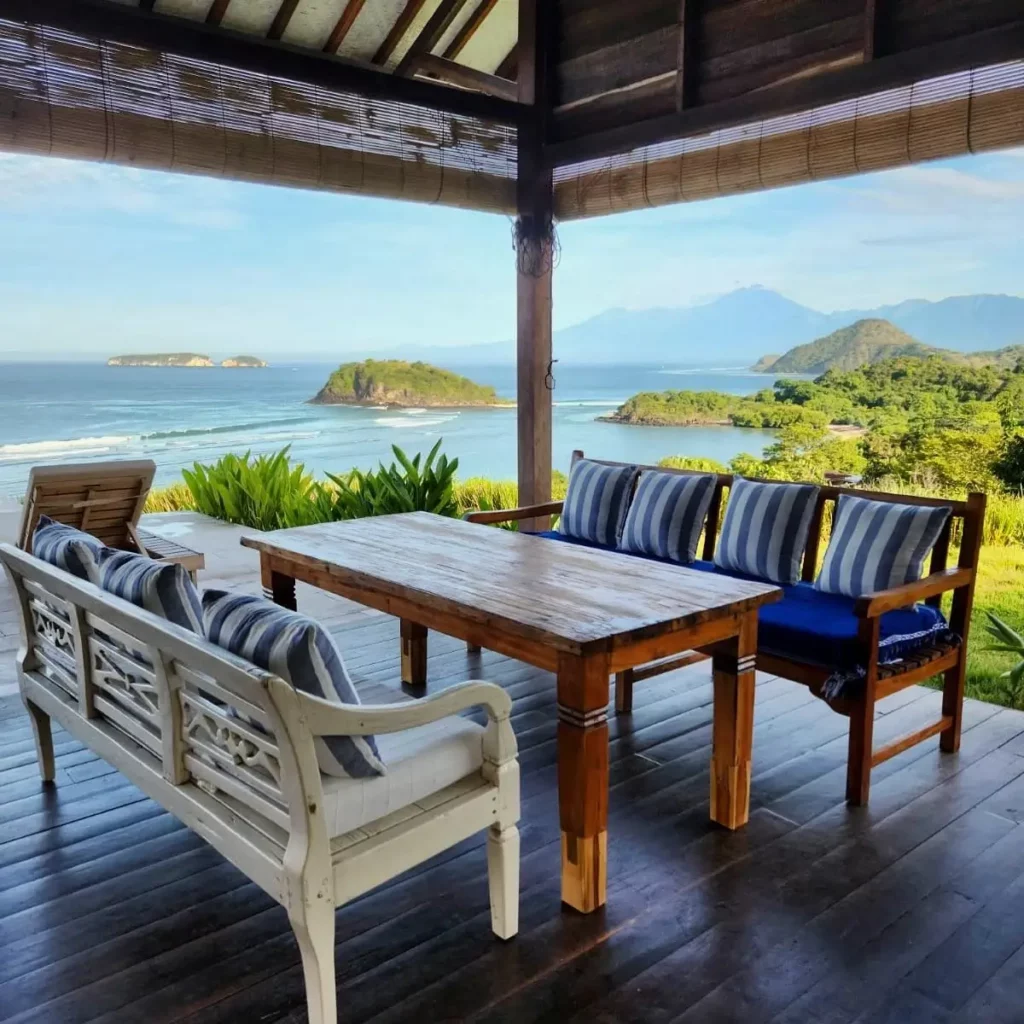 Kertasari Lodge terrace with view of rinjani and ocean